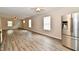 Spacious living area with wood-look floors and natural light at 2026 Spruce St, Indianapolis, IN 46203