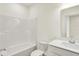 Bright bathroom featuring a shower, toilet, and sink at 2035 Frost Line Ln, Greenfield, IN 46140
