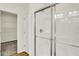 Modern bathroom with a glass-enclosed shower and a glimpse into a convenient walk-in closet at 2035 Frost Line Ln, Greenfield, IN 46140