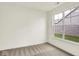 Bedroom featuring neutral carpet, white walls, and views of the neighborhood at 2035 Frost Line Ln, Greenfield, IN 46140