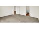 Spacious bedroom with neutral carpet that leads to a connected bathroom for convenience at 2035 Frost Line Ln, Greenfield, IN 46140