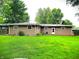Spacious backyard featuring a well-manicured lawn, perfect for outdoor activities and relaxation at 22 Brooklyn Ct, Mooresville, IN 46158