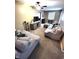 Inviting living room featuring plush sofas, stylish decor, and ample natural light at 22 Brooklyn Ct, Mooresville, IN 46158