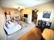Cozy living room with comfortable seating, ceiling fan, and a view into other rooms at 22 Brooklyn Ct, Mooresville, IN 46158