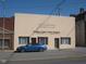 Exterior of a law office building with a car parked in front, street view at 22 W 8Th St, Anderson, IN 46016