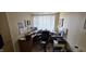 An office space with a desk, chair, and a window at 22 W 8Th St, Anderson, IN 46016