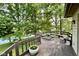 Relaxing back deck with scenic views of the lake and surrounding landscape, ideal for outdoor gatherings and relaxation at 2213 E Canterbury Ct, Martinsville, IN 46151