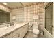 Bathroom with a spacious vanity, toilet, and shower at 2213 E Canterbury Ct, Martinsville, IN 46151