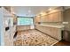 Bright kitchen featuring ample counter space, plentiful cabinets, and large windows for natural light at 2213 E Canterbury Ct, Martinsville, IN 46151