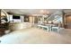 Inviting living room and dining area with a staircase and large windows at 2213 E Canterbury Ct, Martinsville, IN 46151