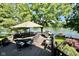 Outdoor dining area on deck overlooking scenic lake views at 2213 E Canterbury Ct, Martinsville, IN 46151