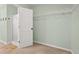 This bedroom features a door to the bathroom and a spacious walk-in closet at 2247 Rolling Hill Ct, Columbus, IN 47201