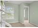 This bedroom has a ceiling fan, carpet, and a closet at 2247 Rolling Hill Ct, Columbus, IN 47201