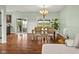 Dining room featuring a wooden table with seating for four under a chandelier at 2247 Rolling Hill Ct, Columbus, IN 47201