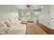 Spacious living room with a comfortable sectional sofa and an inviting natural fiber rug at 2247 Rolling Hill Ct, Columbus, IN 47201