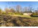 Large backyard with a shed, deck, and mature trees at 2457 N Centerline Rd, Franklin, IN 46131