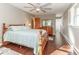 Bedroom with hardwood floors, large ceiling fan, and plenty of natural light at 2457 N Centerline Rd, Franklin, IN 46131
