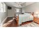 Bedroom with dark wood floors, large ceiling fan, and plenty of natural light at 2457 N Centerline Rd, Franklin, IN 46131