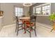 Charming dining area with a round table and four chairs, perfect for intimate meals at 2457 N Centerline Rd, Franklin, IN 46131