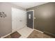 Inviting foyer features neutral walls, tile flooring, coat closet, and a stylish front door at 2457 N Centerline Rd, Franklin, IN 46131