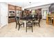 Gourmet kitchen with custom cabinets, stainless steel appliances, island with seating, and plenty of counter space at 2457 N Centerline Rd, Franklin, IN 46131