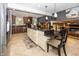 Spacious kitchen features dark granite countertops, wooden cabinetry, and stainless steel appliances at 2457 N Centerline Rd, Franklin, IN 46131