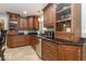 Modern kitchen with stainless steel appliances, granite countertops, and stylish cabinetry at 2457 N Centerline Rd, Franklin, IN 46131