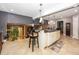 Open kitchen area featuring a center island with countertop seating and modern pendant lighting at 2457 N Centerline Rd, Franklin, IN 46131
