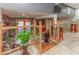 Upstairs living room area with glass railing overlooking downstairs seating area at 2457 N Centerline Rd, Franklin, IN 46131