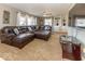 Bright living room boasts a comfortable sectional sofa, built-in shelving, and multiple windows at 2457 N Centerline Rd, Franklin, IN 46131
