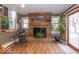 Main living room showing off the natural light and fireplace at 2457 N Centerline Rd, Franklin, IN 46131