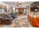 Spacious living room area with fireplace and access to outside deck at 2457 N Centerline Rd, Franklin, IN 46131