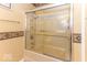 Shower with glass doors and decorative trim at 2457 N Centerline Rd, Franklin, IN 46131
