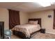 Comfortable bedroom with a queen-size bed, soft lighting, and a cozy atmosphere at 2620 13Th St, Columbus, IN 47201