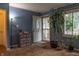 Welcoming entryway with an open door, modern decor, and natural light streaming through the window at 2620 13Th St, Columbus, IN 47201