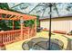 Relaxing deck area with a pergola, seating, and stylish decor for outdoor enjoyment at 2907 Jay Dee Ln, Greenwood, IN 46143