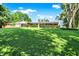 Well maintained home featuring a spacious yard with mature trees on a sunny day at 2907 Jay Dee Ln, Greenwood, IN 46143