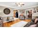 Inviting living room boasts hardwood floors, neutral paint, and plenty of natural light at 2907 Jay Dee Ln, Greenwood, IN 46143