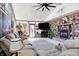 Inviting sunroom with vaulted ceiling, comfortable seating, fireplace, and natural light at 2907 Jay Dee Ln, Greenwood, IN 46143