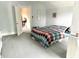 Bedroom with a colorful bed and unique decorations, creating a warm and inviting space at 317 W State Road 44, Franklin, IN 46131