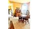 Traditional dining room featuring a decorative hutch, wood table and an arcade game at 317 W State Road 44, Franklin, IN 46131