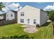 Spacious backyard showcasing a well-maintained lawn and neutral siding, blending aesthetics with outdoor enjoyment at 3351 Summer Breeze Cir, Indianapolis, IN 46239