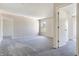 Spacious bedroom with soft gray carpet, lots of natural light, and neutral walls offering versatile design options at 3351 Summer Breeze Cir, Indianapolis, IN 46239