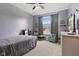 Well-lit bedroom with neutral color palette, window, and soft carpeting at 3599 Chalmers Dr, Bargersville, IN 46106