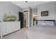 Cozy bedroom with soft gray walls, a decorative dresser, and black trim at 3599 Chalmers Dr, Bargersville, IN 46106