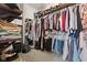Walk-in closet features built-in shelving and ample hanging space for organized storage at 3599 Chalmers Dr, Bargersville, IN 46106