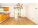 Traditional eat-in kitchen with wood cabinets, laminate counters, and sliding glass door at 391 W 500 S, Anderson, IN 46013