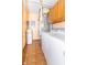 Bright laundry room with modern washer and dryer, tiled floor, and ample storage cabinets at 391 W 500 S, Anderson, IN 46013
