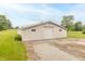 A versatile outbuilding with a light-colored exterior and ample space, perfect for storage or hobbies at 391 W 500 S, Anderson, IN 46013