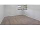 This bedroom has neutral carpet and natural light at 406 W Mcgregor Rd, Indianapolis, IN 46217